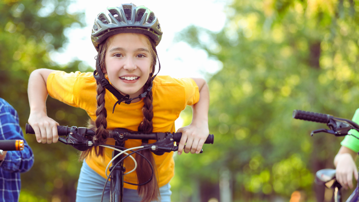 children ride bicycles