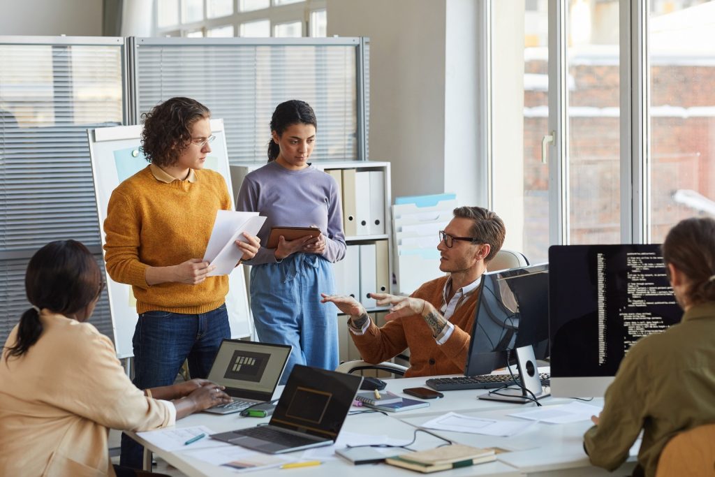 Multi Ethnic IT Development Team in Office